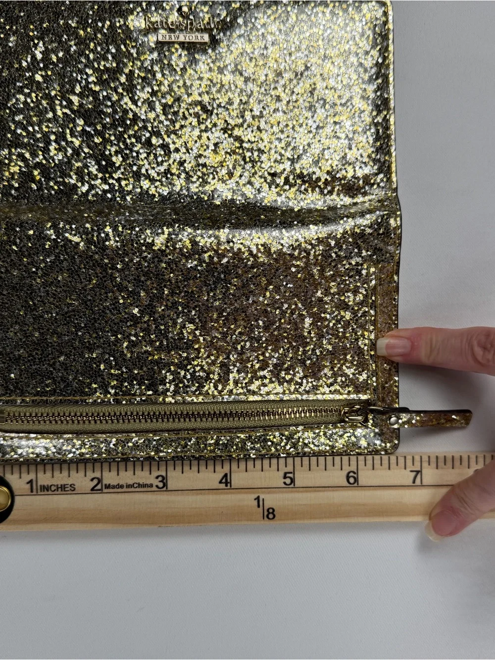 kate spade Gold Glitter Folio wallet with magnetic closure - fun and flirty